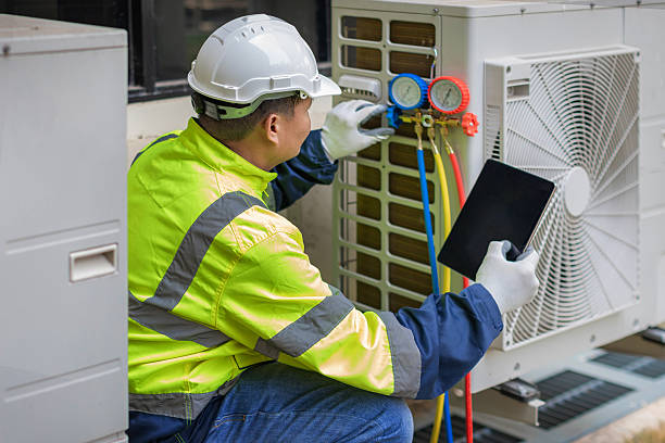 Professional Air Duct Cleaning technician working in Groveland, MA